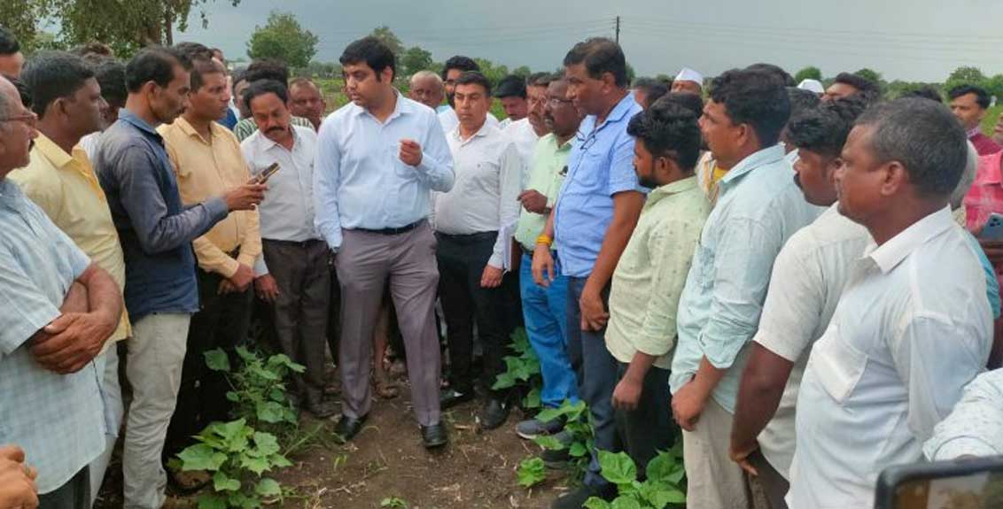 Minister Mahajan interacts with farmers through video call