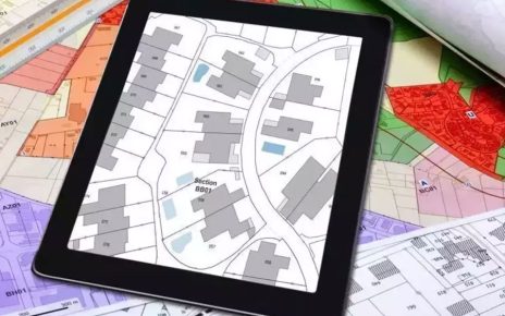 Drone surveying over an urban landscape with GIS technology, representing the modern land record digitization process in Shirdi as part of the 'Naksha' project.