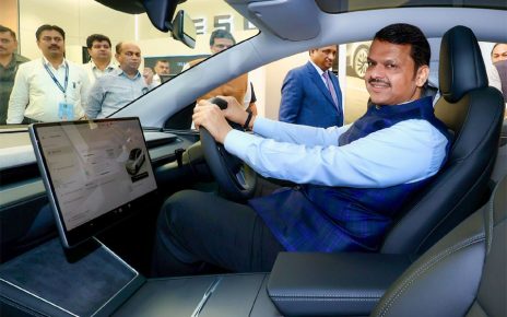 CM Devendra Fadnavis inaugurating Tesla Experience Center in Mumbai with Tesla representatives